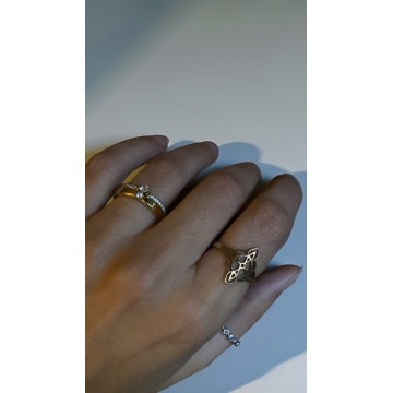 ANEL NÓ DA BRUXA DOURADO AÇO AJUSTÁVEL