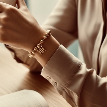 PULSEIRA NÓ DE BRUXA – DOURADA AÇO INOXIDÁVEL